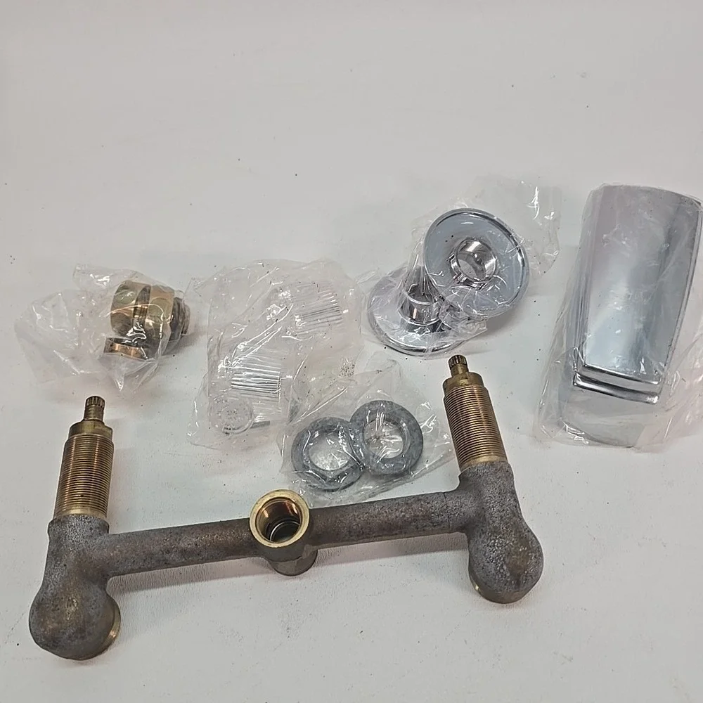 The American Brass Manufacturing Co. Brass 2-valve Tub Filler Threaded Escutcheo